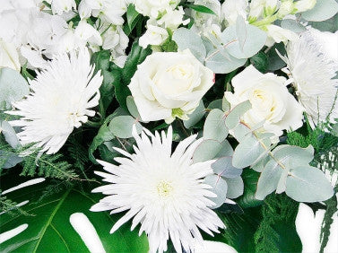 White Flowers in an Oasis Dish