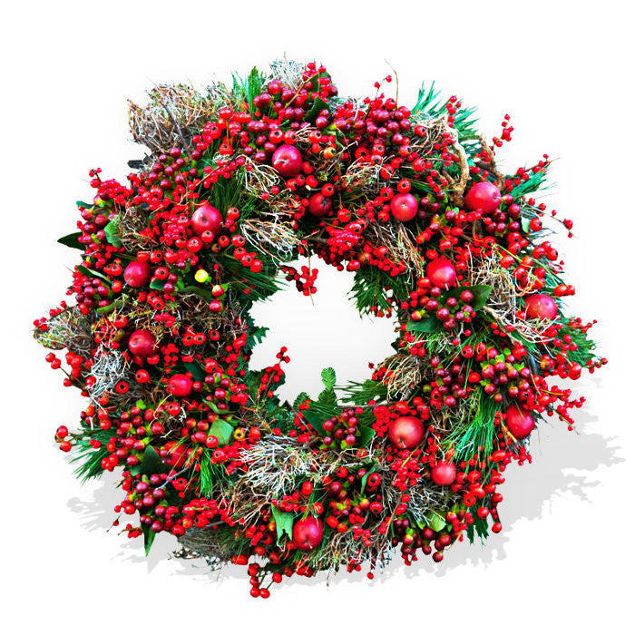 Green and red Christmas wreath with red berries