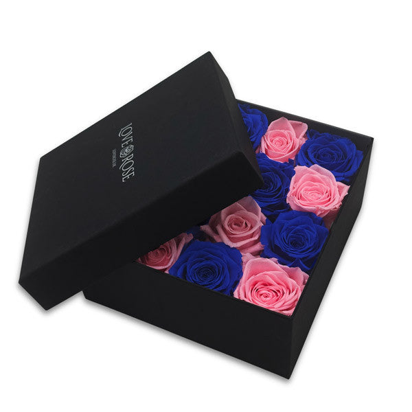 Preserved Blue and Pink Roses in a Black Box